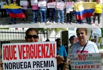 Salen a protestar en Barranquilla en contra de Santos, en rechazo al premio otorgado.